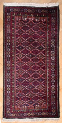 BELOUTSCH Persien um 1980, Wolle auf Wolle, Seiten - wie bei Beloutschteppichen üblich - mit Ziegenhaar umwickelt, 188x97cm, gut erhalten