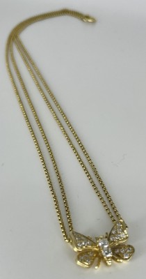 Schmetterlingsanhänger an doppelter Kette, mit Brillanten besetzt, Gelbgold 585 (getestet).