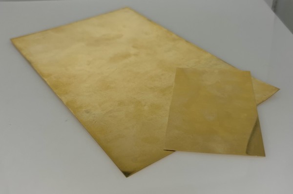 Goldplatte, 833 Kronengold, zwei Stück, 77,69g.