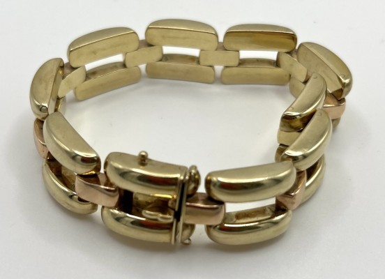 Armband, 585 Gelbgold, gegliedert. Gliederarmband in Gelbgold mit Roségold-Verbindungselementen. Mit Steckverschluss.