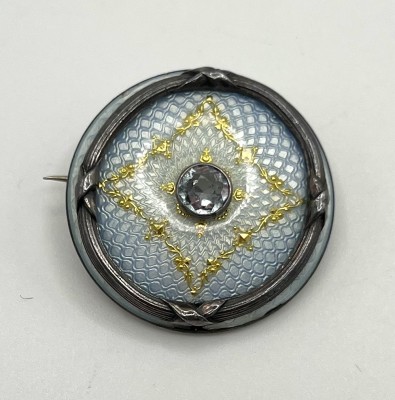 Emaille Brosche, im Wiener Jugendstil, mittig Bergkristall um die 0,5ct und Silbermontur.