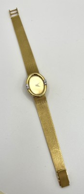 Chopard Damenarmbanduhr, 750 Gelbgold, mit vier Brillanten auf der Fassung je um 0,05ct. Referenznummer 6880450311, gesamt 53,48g.