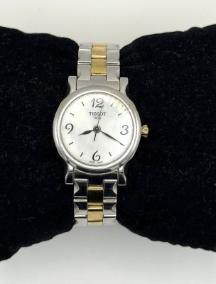 Tissot Damenarmbanduhr, 1853, Wasserresistent, Stainless Steel. Bicolor mit vergoldeten Elementen am Armband. Arabische Ziffern bei zwölf, drei, sechs und neun Uhr. Funktion nicht geprüft.